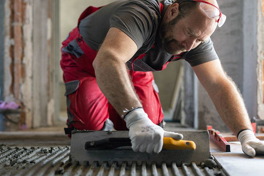 A Superior Skilled Trades form carpenter working in an industrial construction job site.